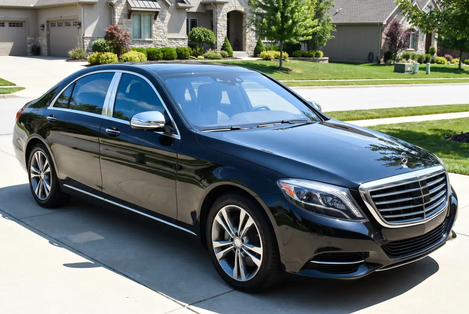 Sedan with factory chrome window trim and grille