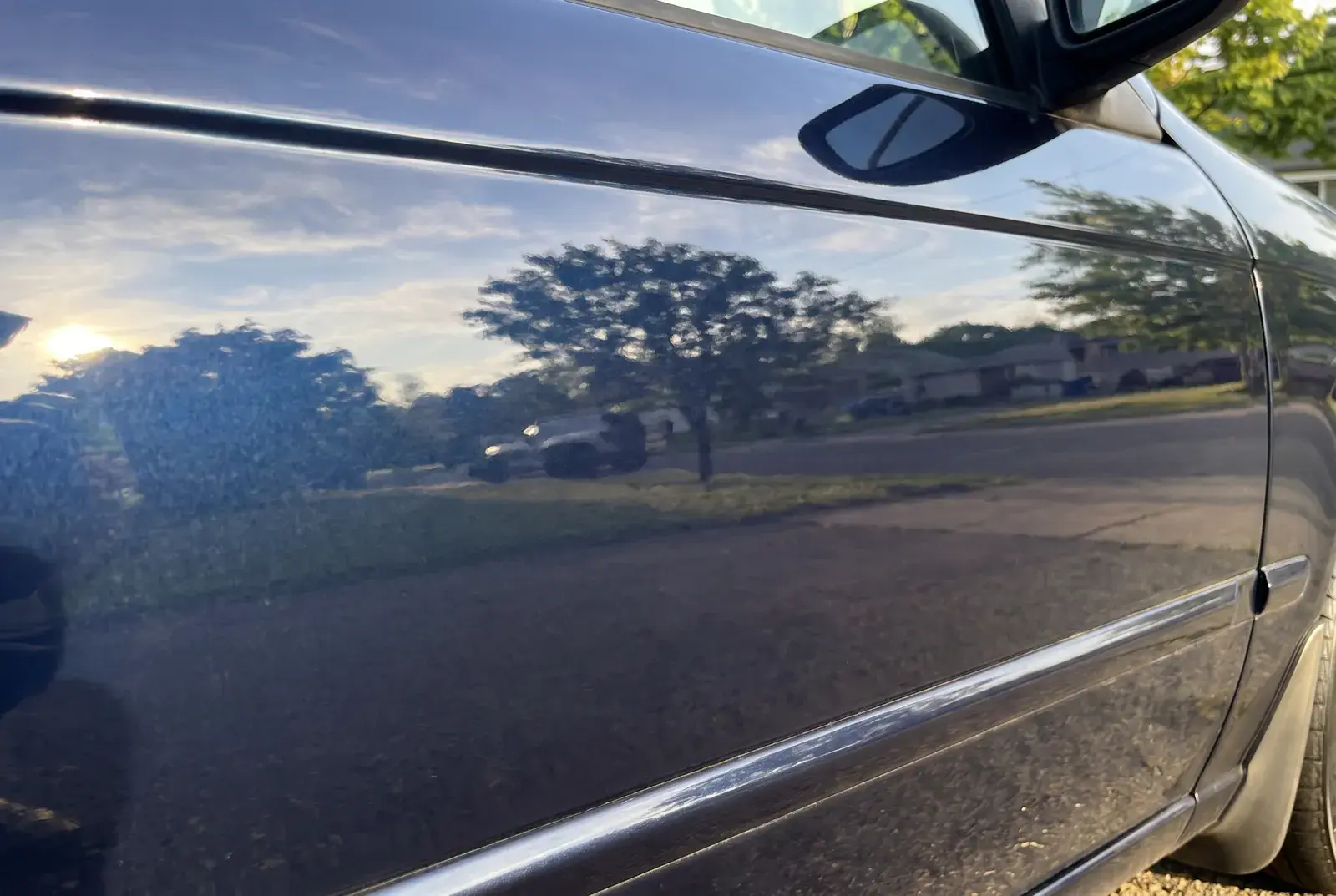Paint after correction — deep mirror gloss with clean reflection